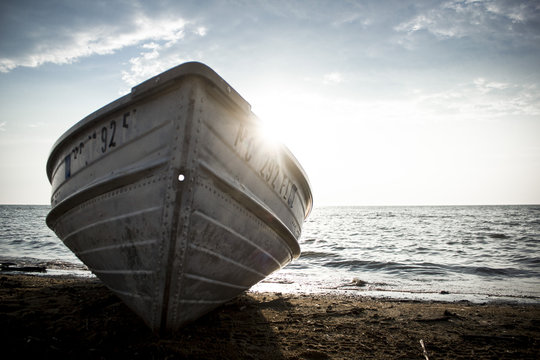 Front Facing Empty Row Boat On Beach 