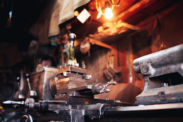 Lathe for production of parts. Concept industrial production in the garage, business.