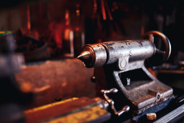 Lathe for production of parts. Concept industrial production in the garage, business.