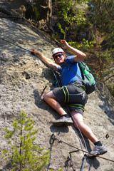 Tourist on via ferrata