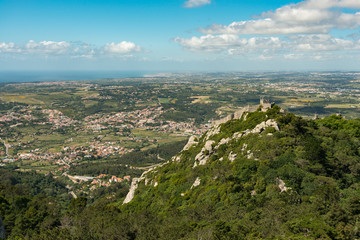Fototapeta na wymiar View from the Pena Palace of the Castle of the Moors and Sintra in Portugal