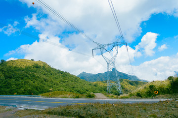 Beautiful landscape of Papallacta mountains in a sunny day with electrict towers near Papallacta road located in Quito Ecuador