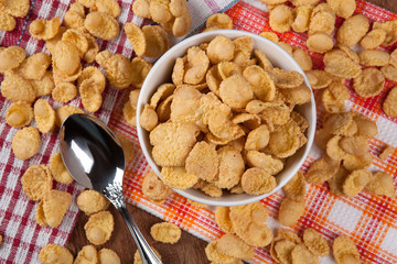 pile of cornflakes and a spoon