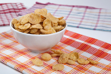 Bowl with popcorn and napkins