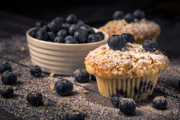 blueberry muffin, wood background, horizontal