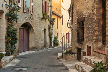 Narrow street  in the old town  in France.
