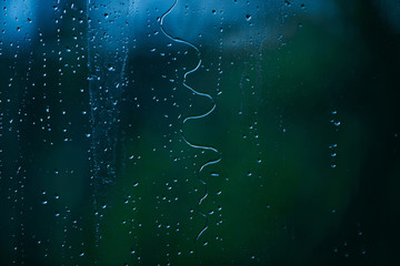 wet glass of window with water drops