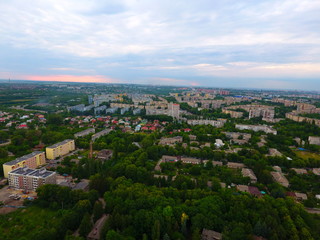 Fototapeta na wymiar Aerial view. Houses and roads in the city Dnepr, Ukraine.