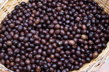 basket with dark olives
