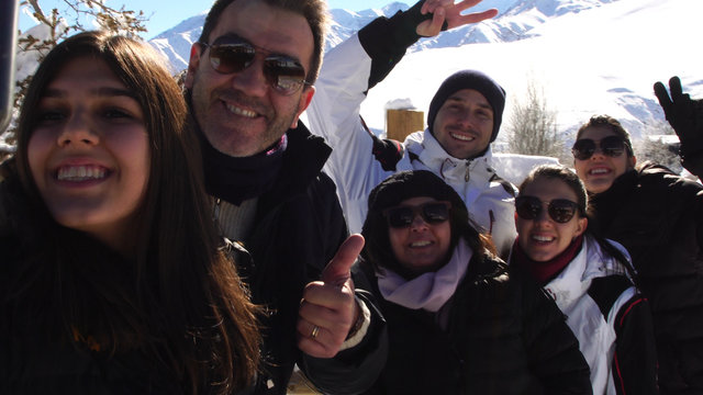 Taking a Selfie of a Family in Valle Nevado, Chile