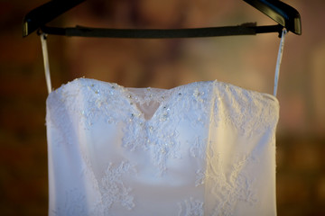 Wedding Dress, dress on a hanger, dress hanging for copy space. Wedding wallpaper