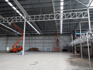 worker with constion after heavy rain