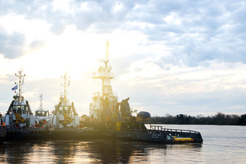 Tugboats are seen in the coast of Parana River