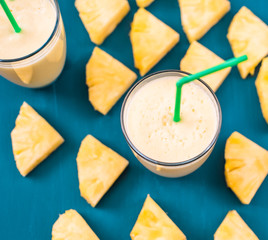 pineapple smoothie on a blue background