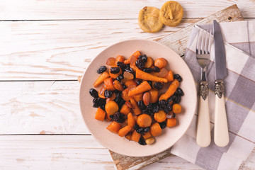 Jewish Tzimmes dessert with carrot, raisins and dried fruits
