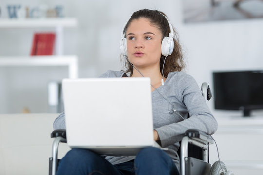 disabled handicapped girl with laptop computer