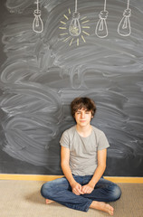 Handsome teenager boy getting an idea - back to school educational concept