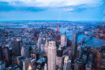 Aerial view of downtown Manhattan and Financial District at dusk. 