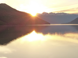 Sunsets along Lake Revelstoke. British Columbia,Canada. Beautiful and serene sunset images from the Selkirk Mountains