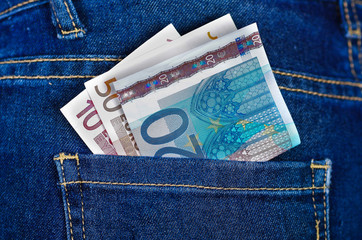 Money bill inside of jeans back pocket