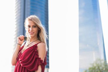 Fototapeta premium happy beautiful blonde woman smiling looking at the camera and posing