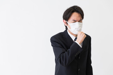 マスクをしたミドル男性　ビジネス