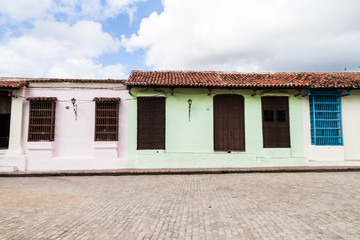 Colorful houses at San Juan de Dios square in Camaguey, Cuba