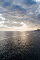 Sea and the cloudy sky