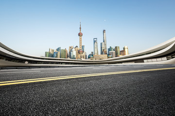  Empty asphalt road and modern building in Shanghai,China