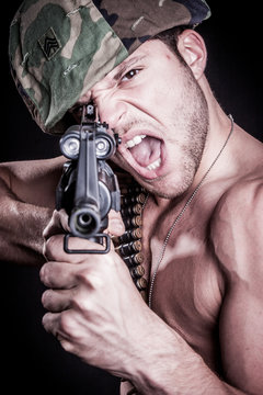 Military Man Shooting Gun