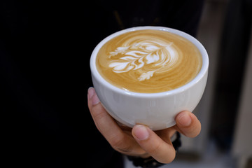 Making of latte art by barista