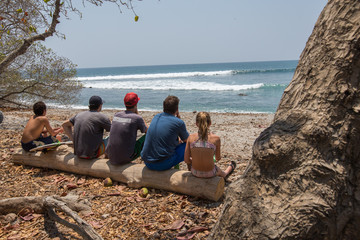 Surfers check out the conditions in Santa Teresa, Costa Rica