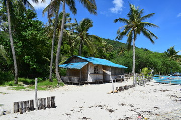Boat and fisherman's house in the sea.selective focus.