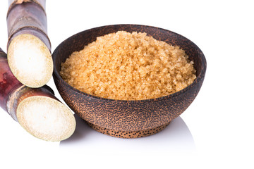 Sugarcane and brown sugar close up
