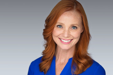 Bright white teeth toothy smile from pretty middle age mature older woman after dental visit