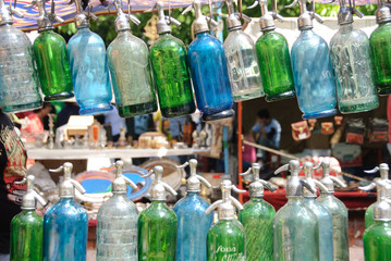 Green, Blue, and Clear Glass Bottles