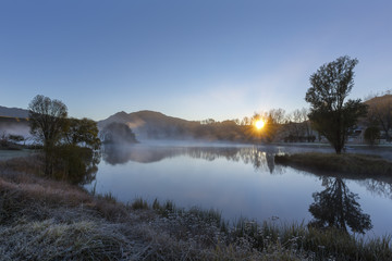Mist on the water at sunrise