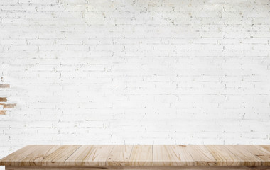Mock up wooden table with white brick wall.
