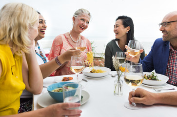 Mature Friends Fine Dining Outdoors Concept