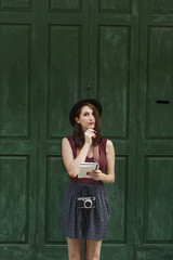 Obraz premium Woman Making Notes Outside City Concept