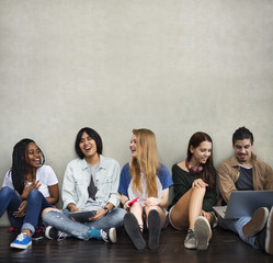 Diverse young people hanging out together