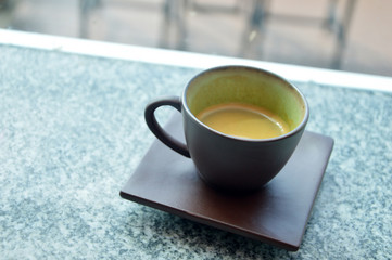 hot espresso coffee in brown Ceramic Cup