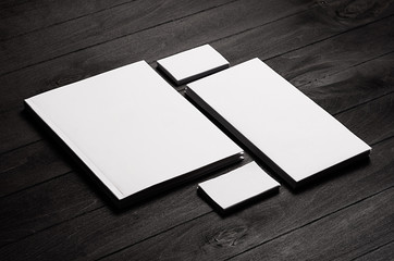 Corporate identity template, stationery set on black stylish wood background. Mock up for branding,...