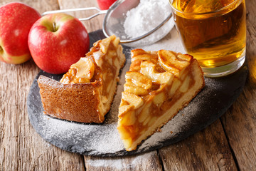 Two pieces of apple pie close-up and apple juice. horizontal