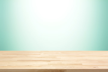 Wood table top on white and green gradient abstract background