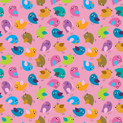 Seamless decorative background of multi-colored cute birds