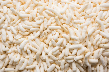 Puffed rice also known as Murmura or Murmure in hindi served in a colourful ceramic bowl or plate...