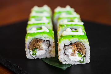 Delicious rolls with fish and cheese	