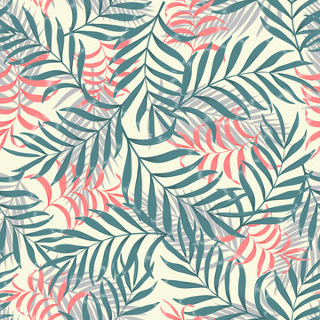 Tropical background with palm leaves. Seamless floral pattern
