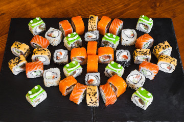 Delicious rolls with fish and cheese	